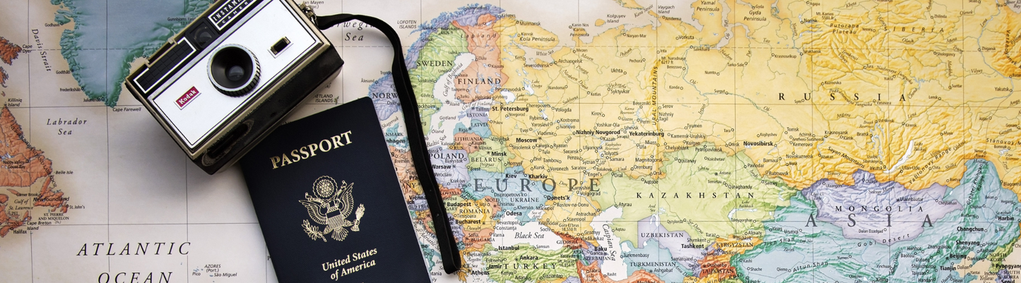 A cheerful family enjoying a vacation on the beach, highlighting the joy of travel and family bonding. The image represents expert travel tips from Kate Aufiero, a family travel advisor, alongside Grace & Haven’s favorite travel products.