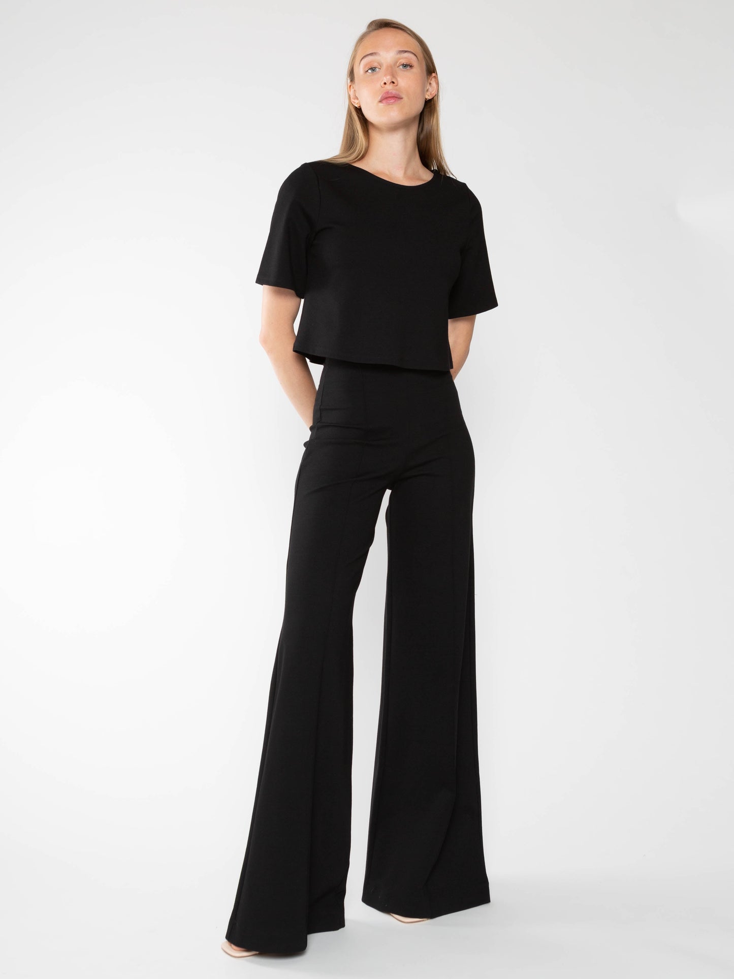 A timeless high-waisted, wide-leg pant crafted from luxurious ponte knit.