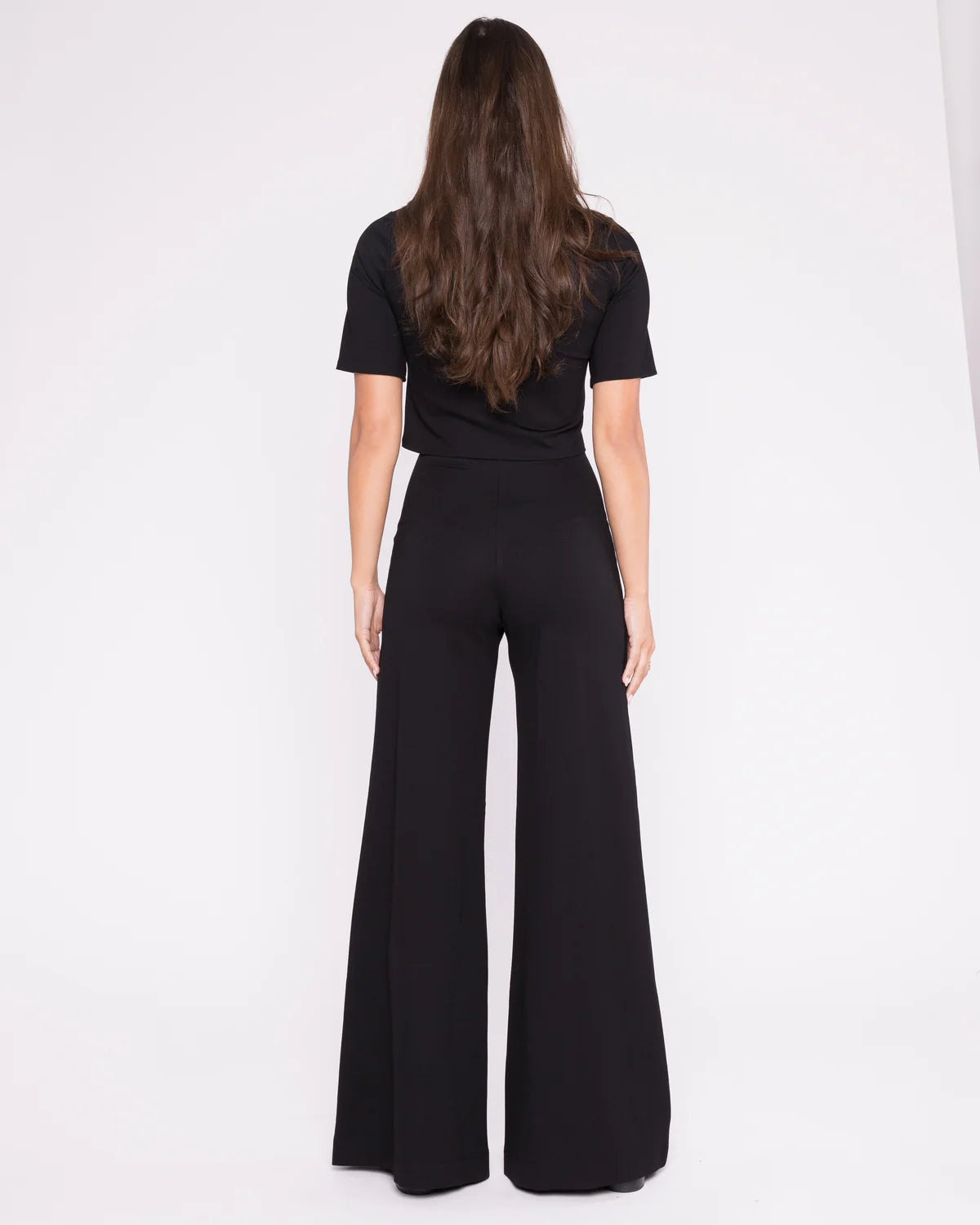 The exaggerated wide-leg and elevated waistline are designed to enhance your natural shape, creating a flattering look from every angle.