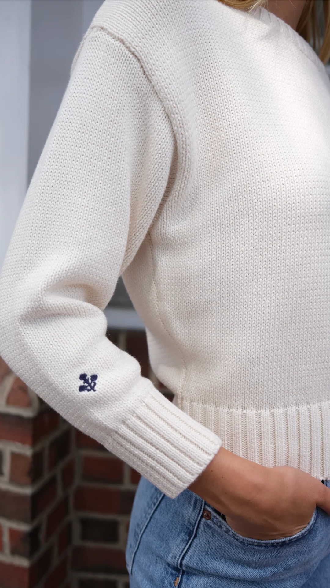 Soft, high-quality cotton knit of the Marea Lake Sweater in navy and ivory, showcasing its breathable fabric and impeccable craftsmanship by Connecticut-based brand Marea