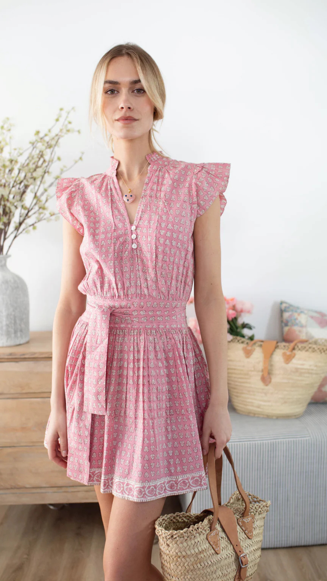 Whether worn on its own or layered under a cardigan or blazer, this versatile dress transitions seamlessly from day to night.