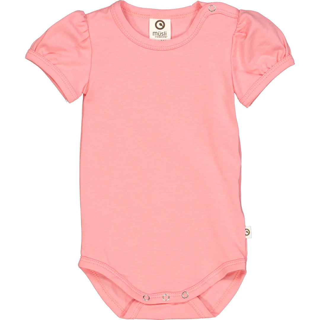 Front view of the Puff Sleeve Onesie in pink, made from soft organic cotton with short puff sleeves and press-button openings.