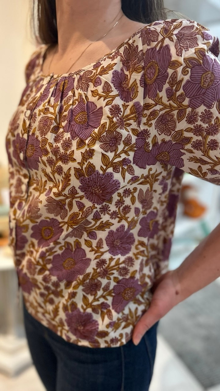 Front view of the Sophie Top in Lilac Orsay Floral by Marea, featuring the vibrant floral pattern and playful ruffle sleeves, ideal for spring and summer wear.