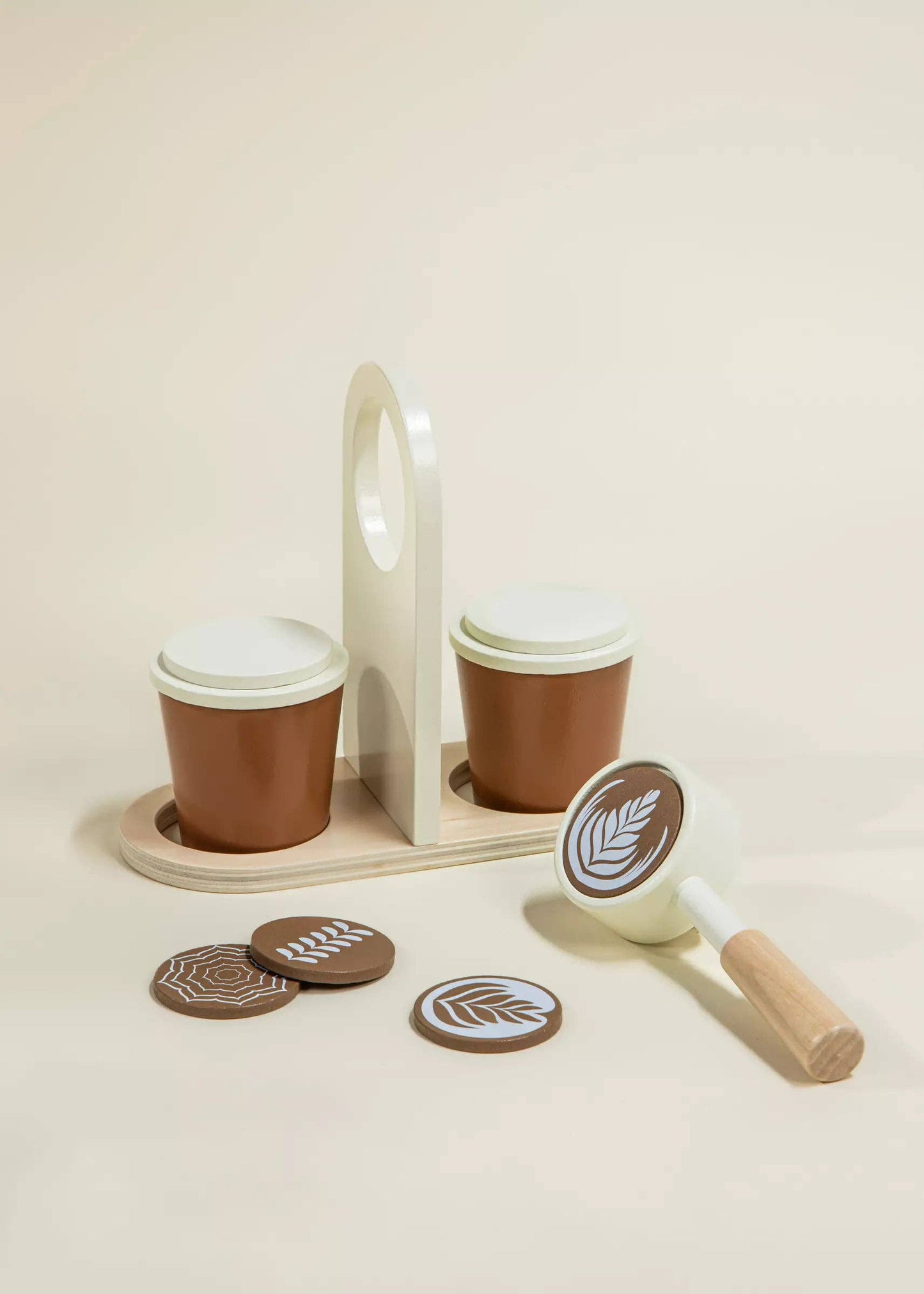 Close-up of wooden cup holder for easy transport of play coffee cups