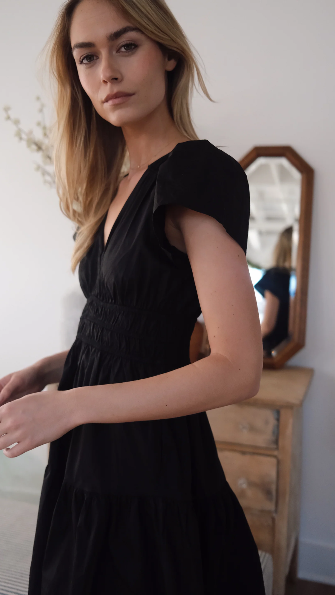 Close-up of the Anna Dress’s structured cotton fabric and perfectly flirty length, suitable for heights 5'0 to 5'10.