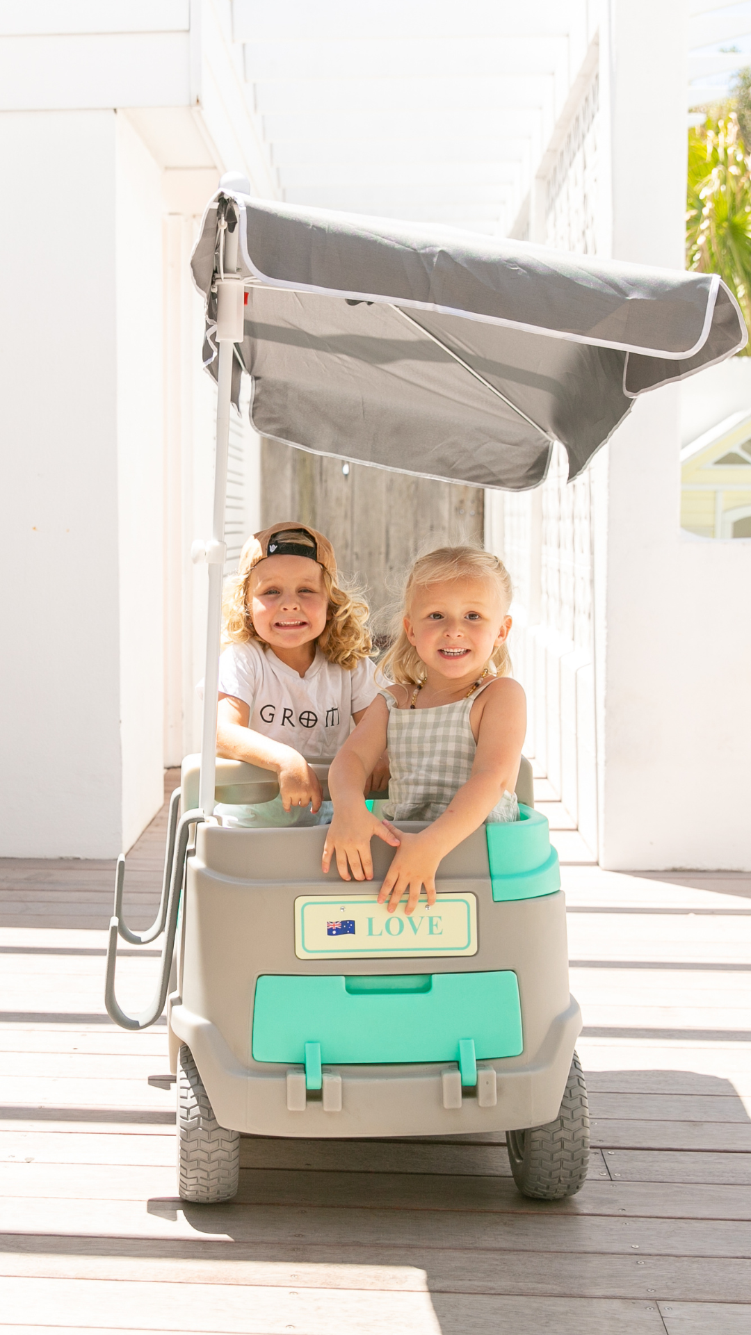 Back view of the Burleigh Wagon Kids Stroller & Beach Wagon with attached cooler, perfect for beach outings and family adventures.
