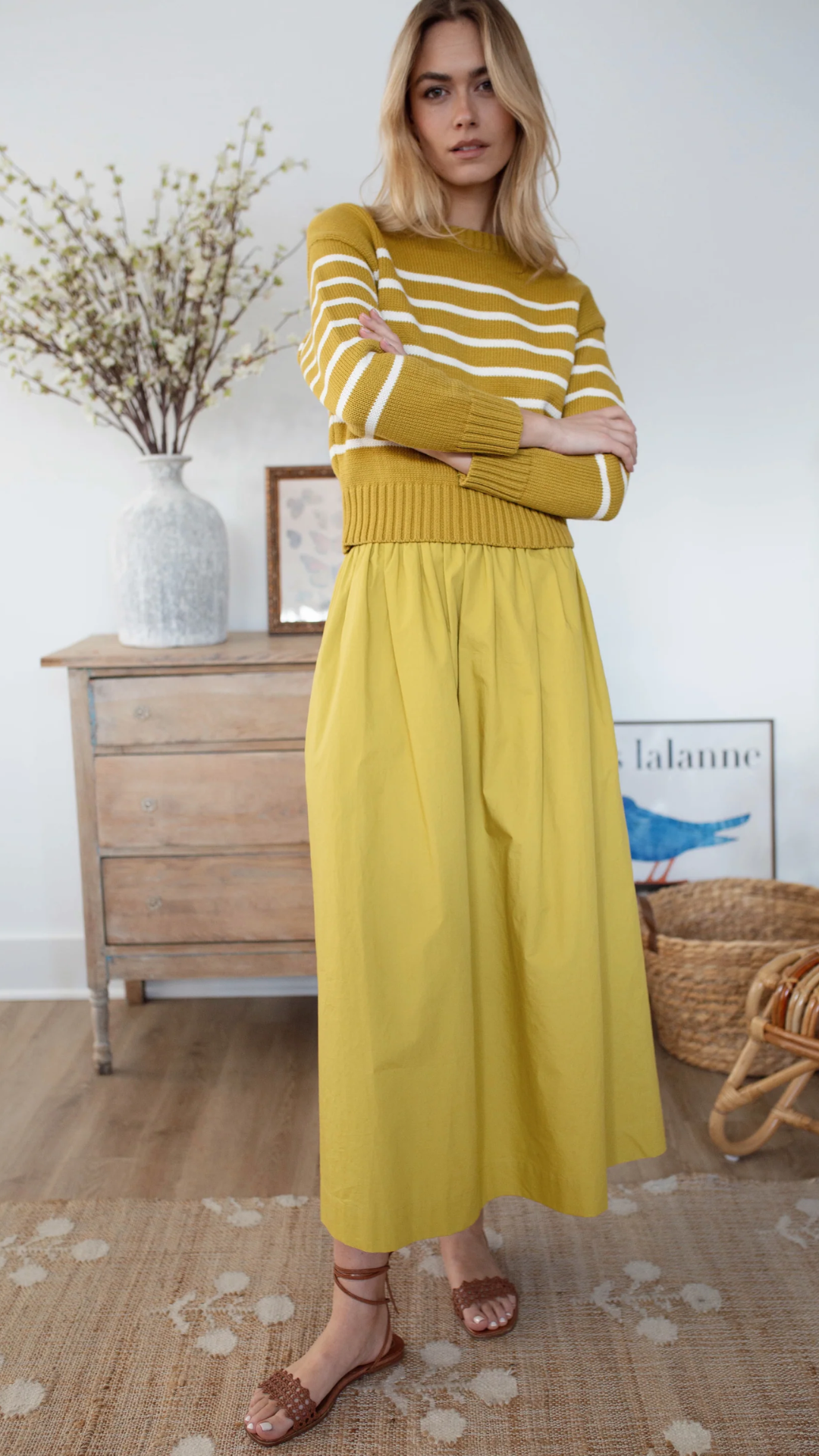 High-waisted, flowy Charlotte Skirt styled with Lake Sweater in the studio, highlighting its versatility for day-to-night looks.