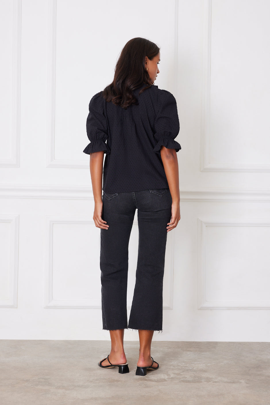 Back view of the Chloe Shirt in white clip dot cotton, showing the flowy fit and timeless, romantic style.