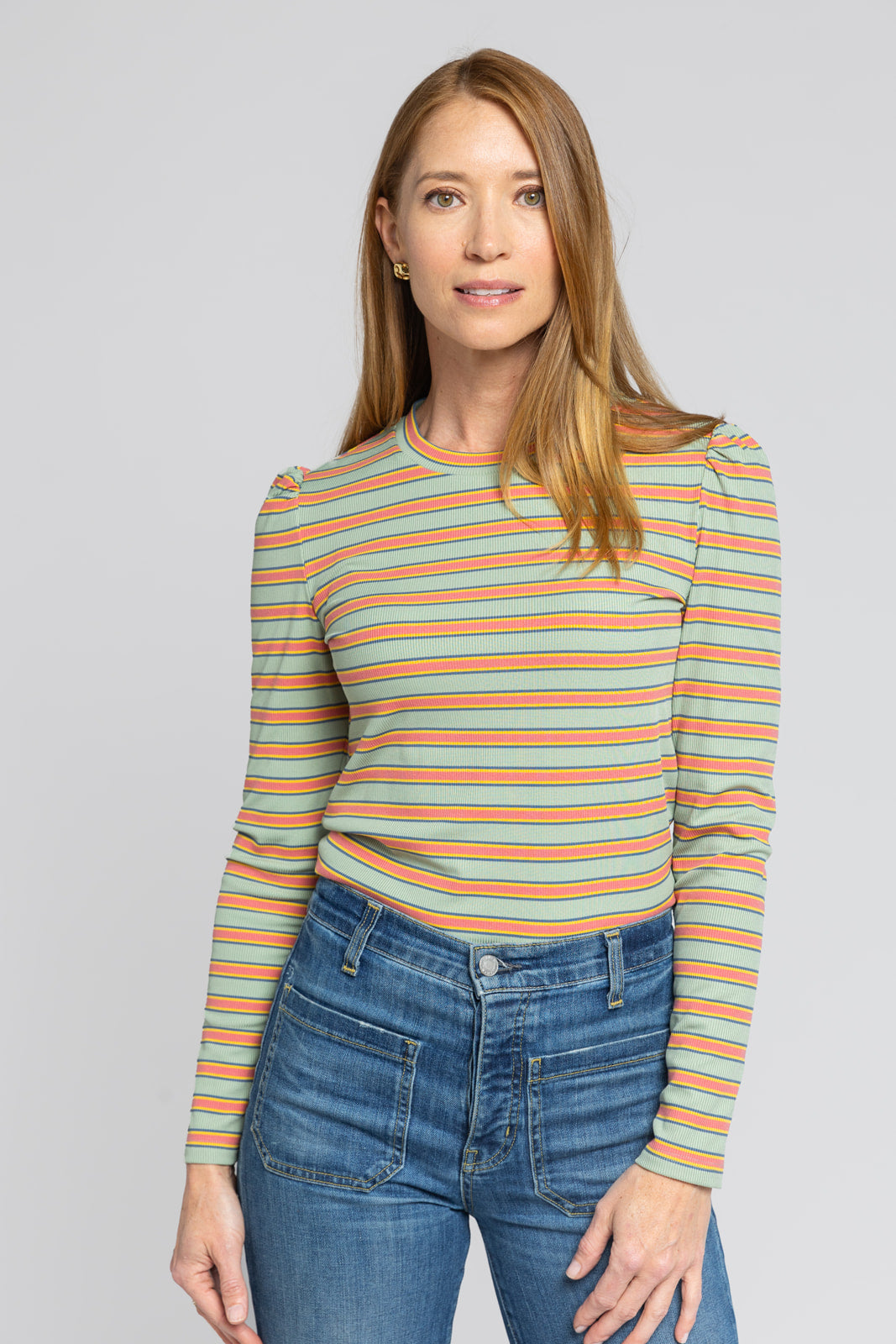 Side view of Dylan Striped Knit Top showing subtle puff shoulder detail and lightweight fabric.