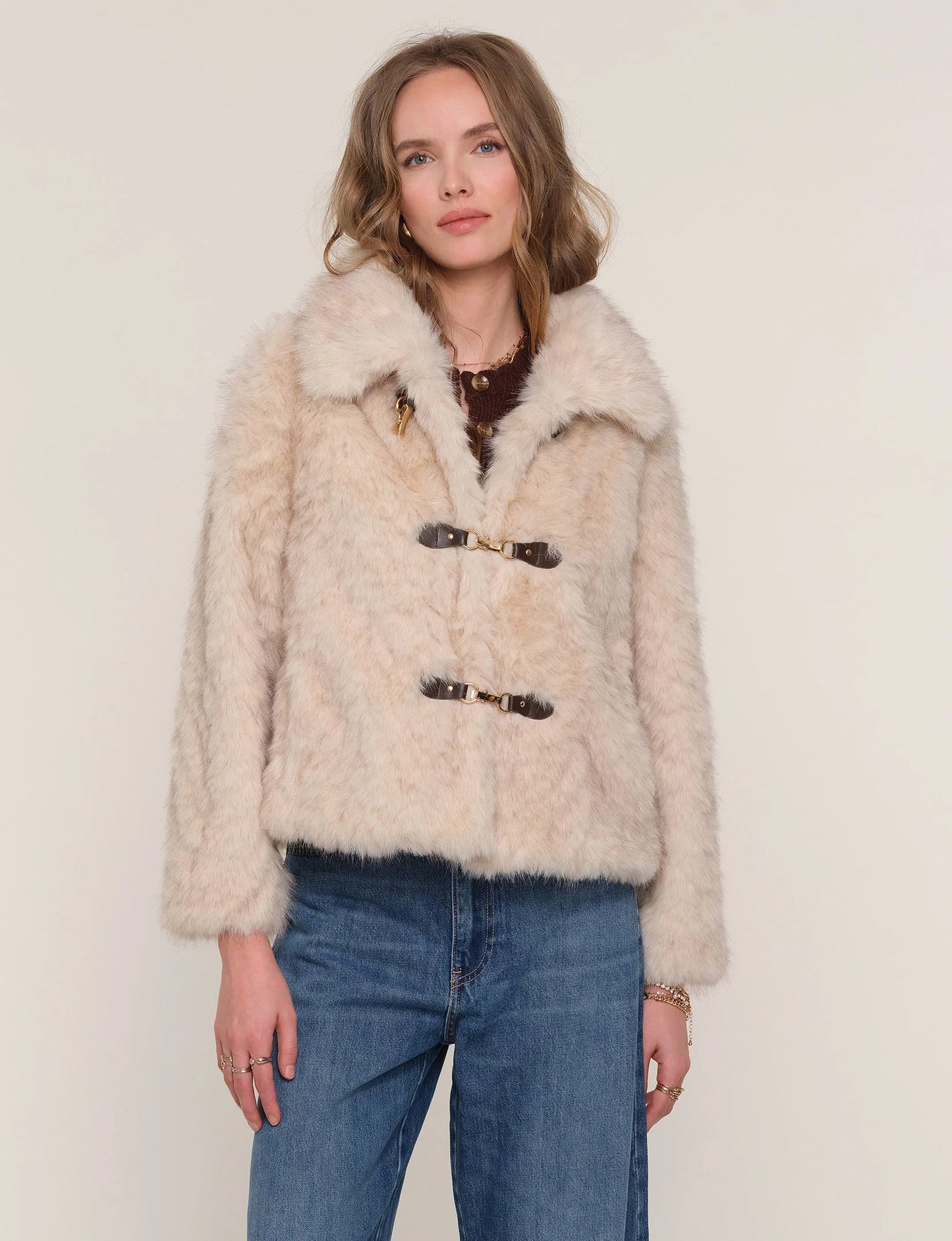 Mid-distance view of Elsbeth Faux Fur Jacket on model, showcasing relaxed fit and cozy faux fur detail.