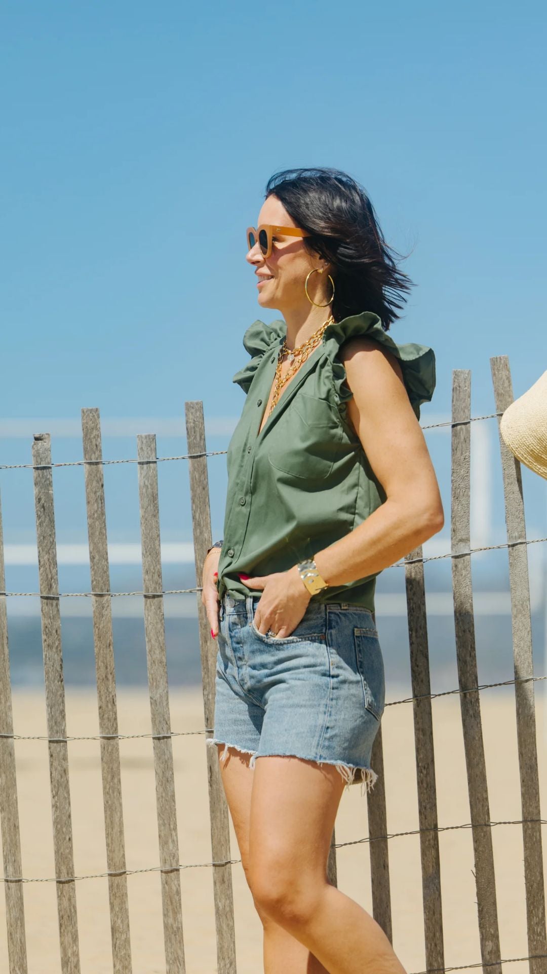 KMJ Olivia in Olive styled with denim jeans for a casual, effortless vintage-inspired outfit.