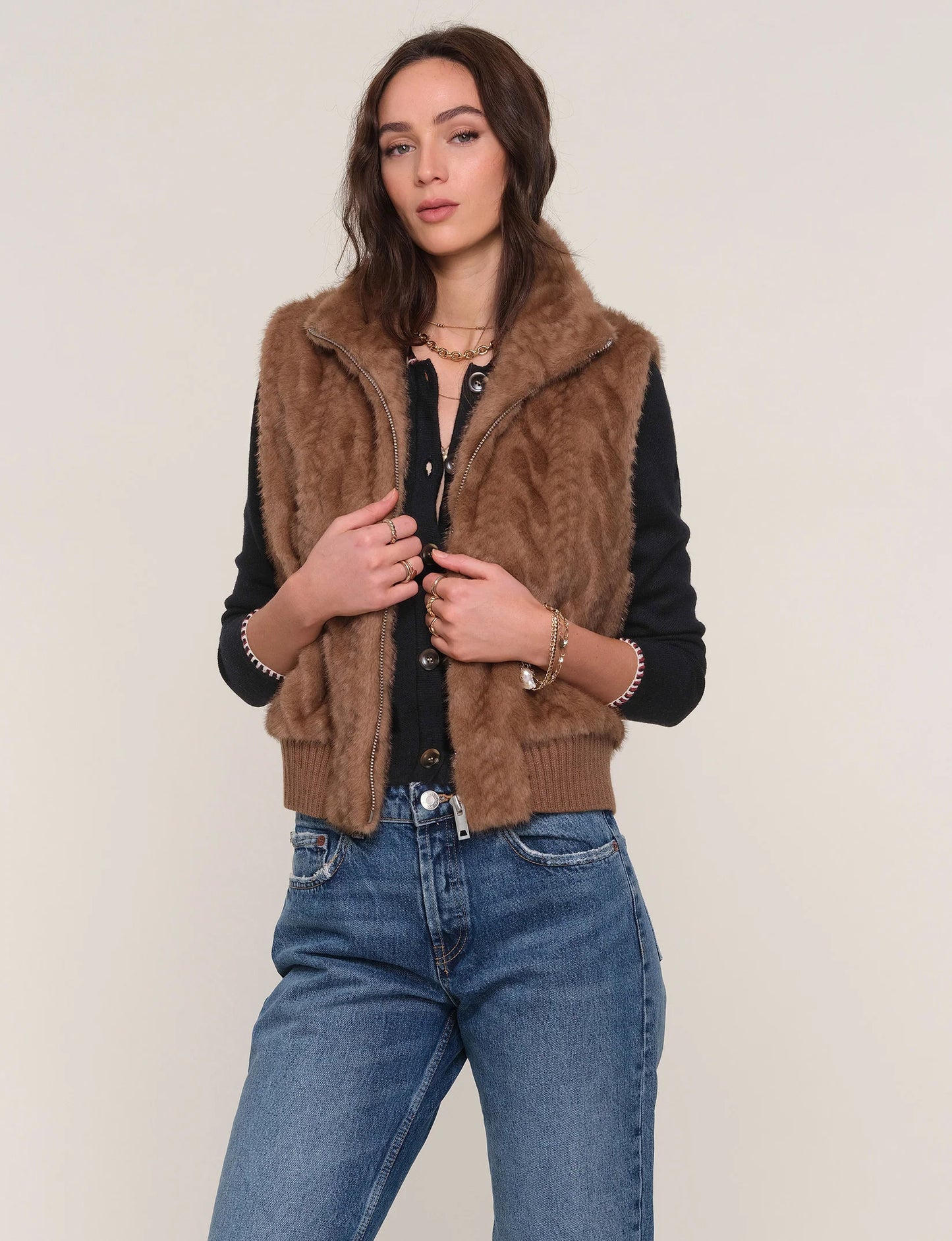Model wearing The Liana Vest with denim, highlighting casual chic style and plush texture.