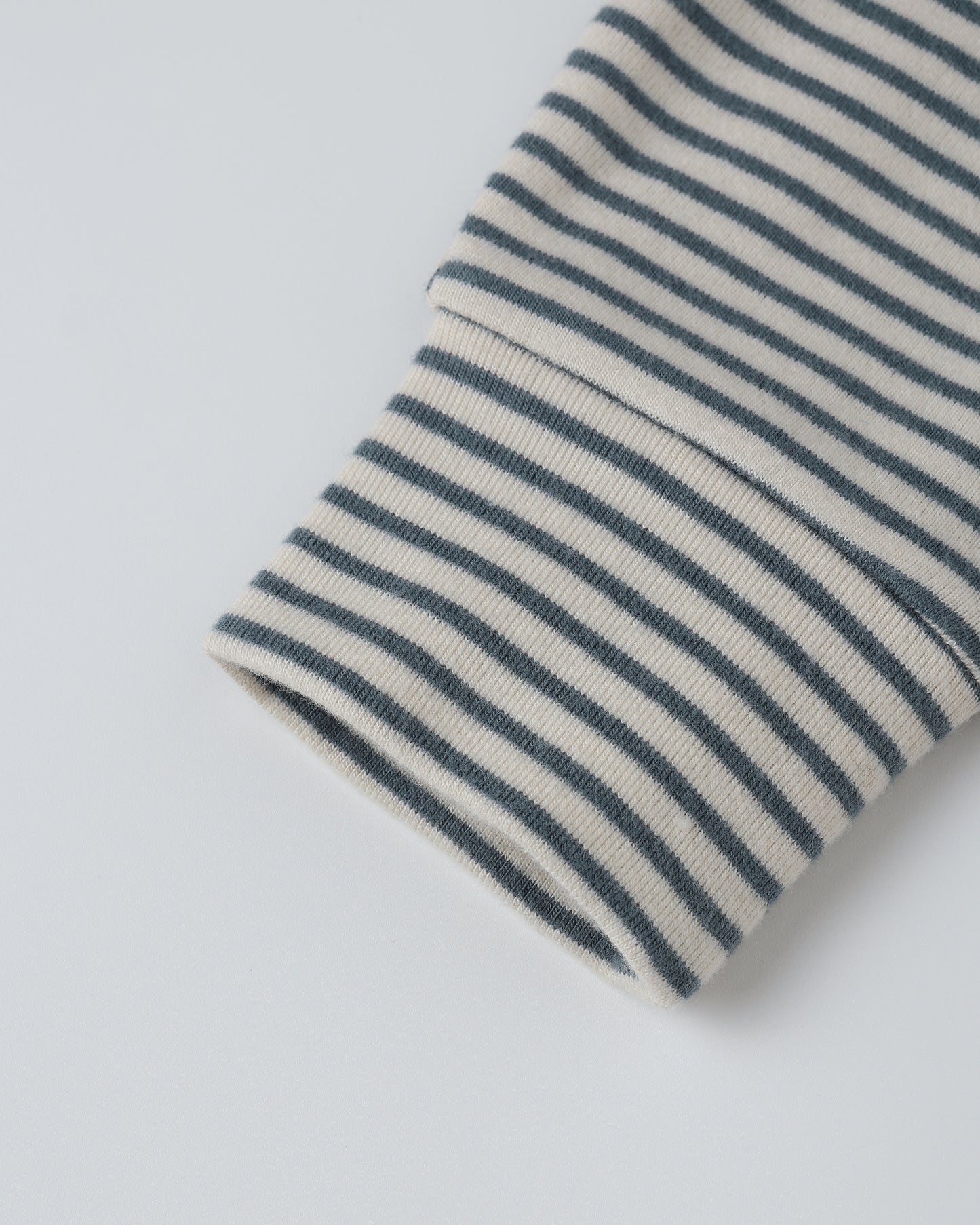 Close-up of the Ocean Micro Stripe Drawstring Pant, focusing on the fabric texture and stripe detail.