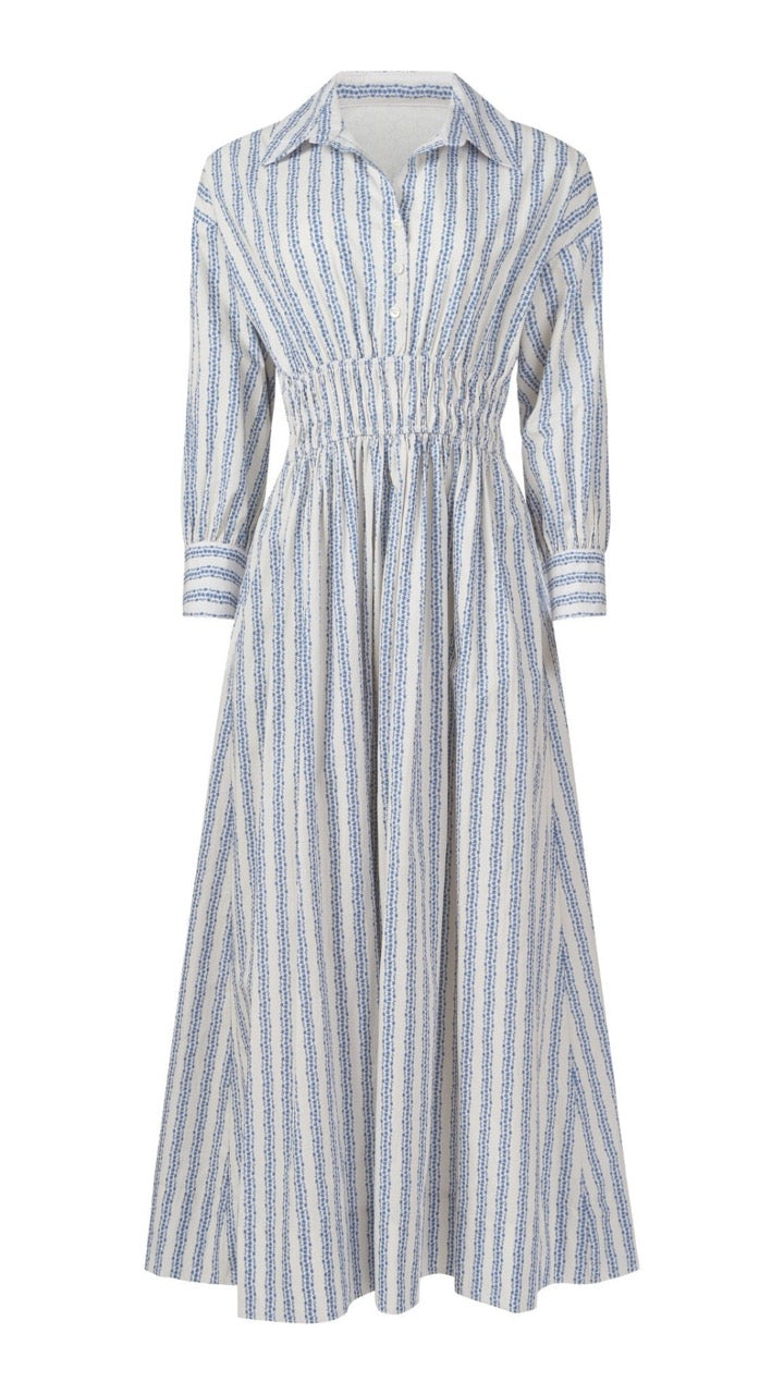 Flat lay of the Sable Dress in floral stripe, front view showing collar, button placket, and cinched waist details.