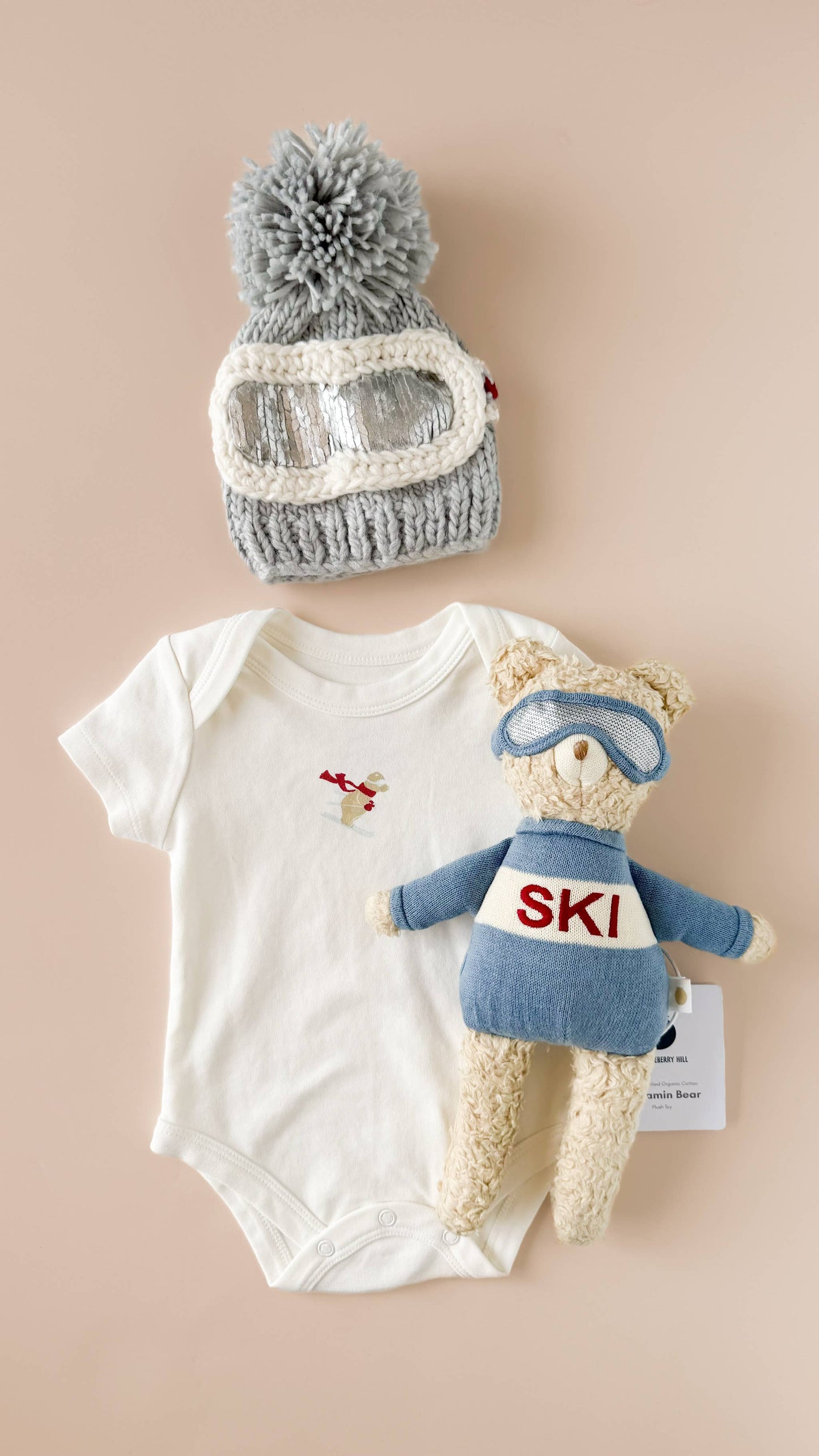 Bowie Grey Ski Goggles Beanie flatlay on neutral background showing knit texture and design