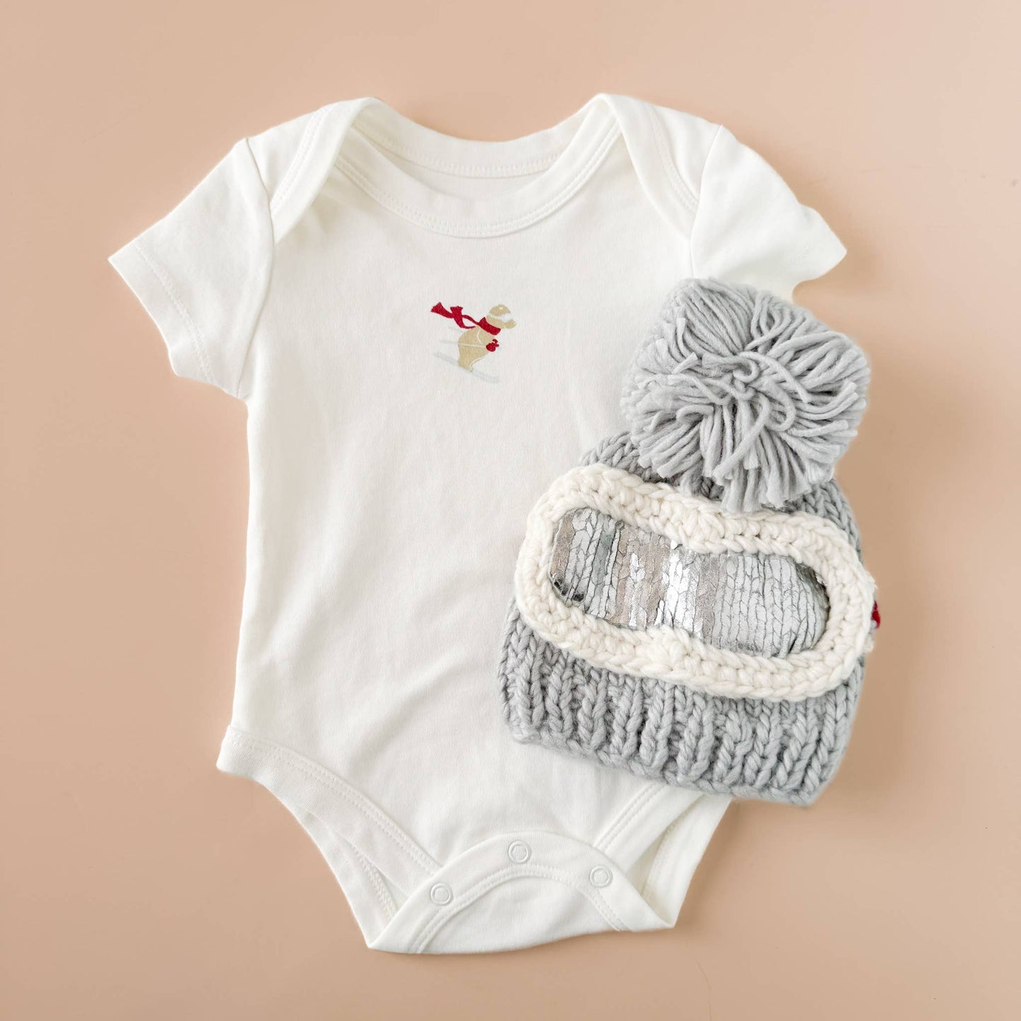 Overhead view emphasizing pom-pom and metallic detail