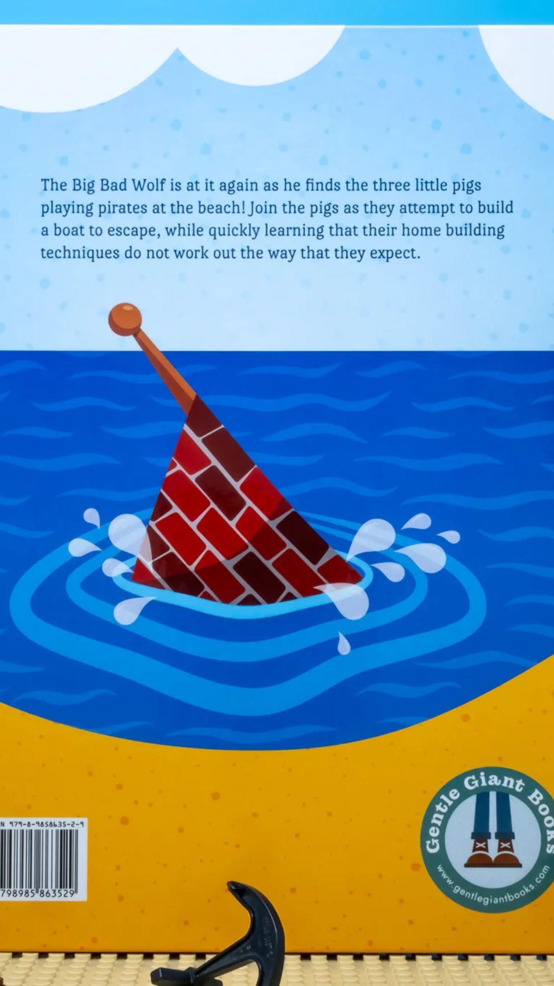 Back cover of “The Three Pirate Pigs” children’s book featuring a brief synopsis and local Minnesota author credit.