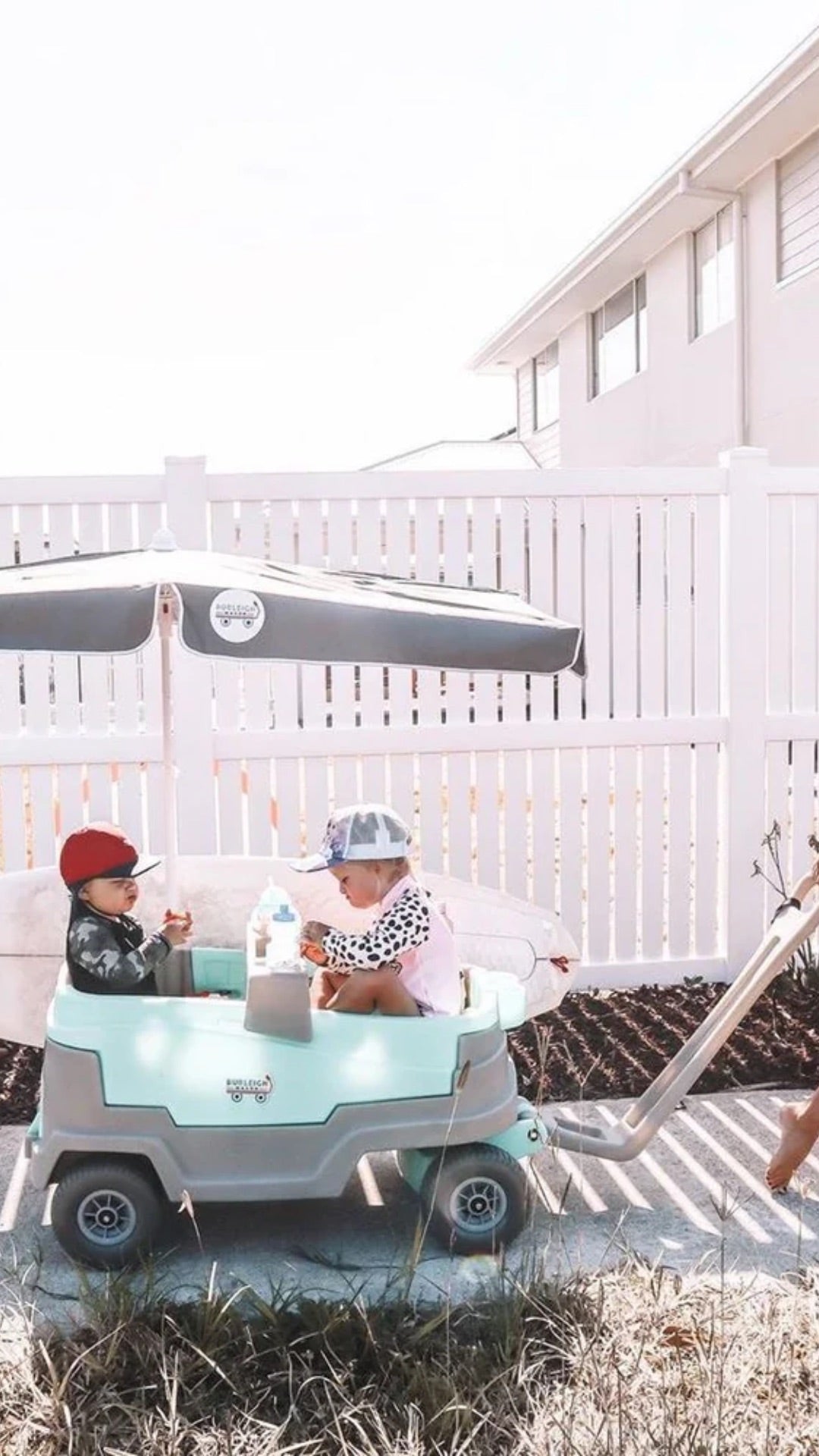 Side view of the Burleigh Wagon showcasing the kids beach wagon and cooler storage, designed for easy transportation.