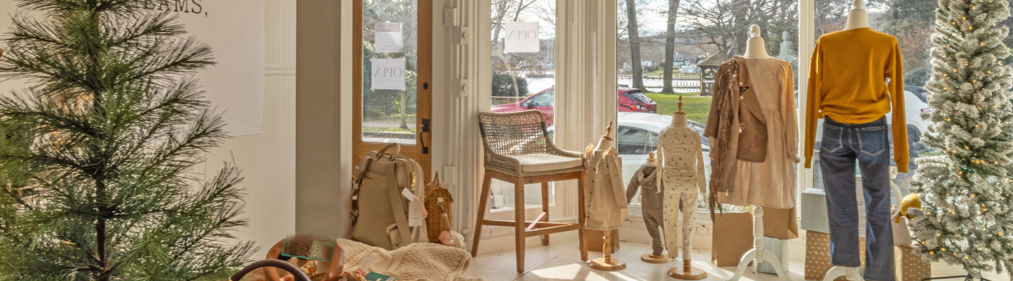 Grace & Haven store interior decorated for the holidays, featuring cozy gifts, seasonal decor, and budget-friendly shopping options in Essex, CT.