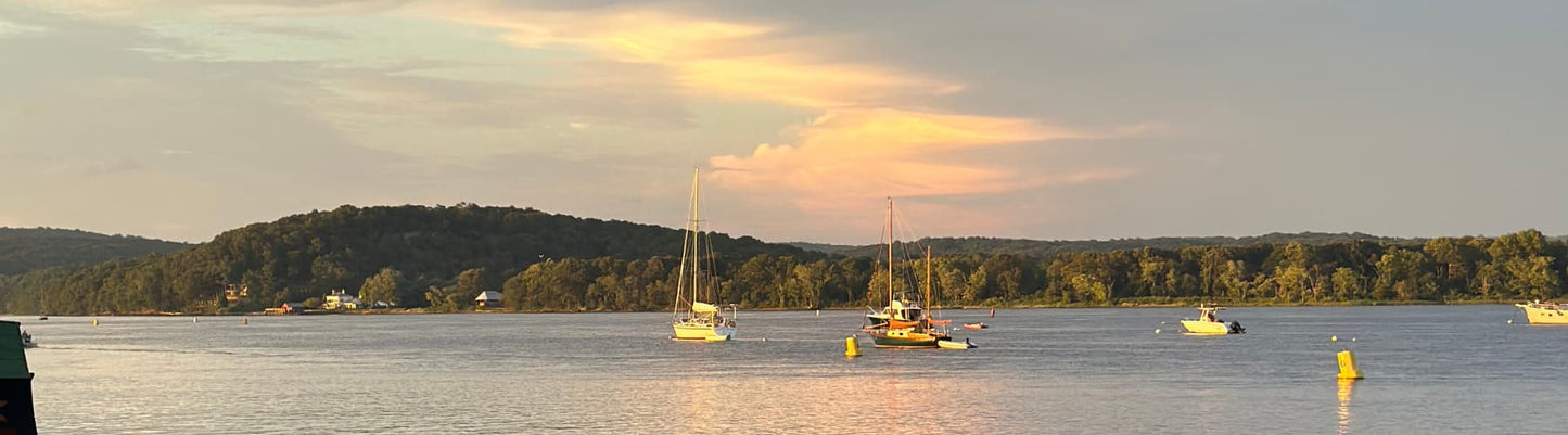 Essex, Connecticut waterfront and Main Street during Fourth of July weekend, a historic Connecticut River town known for America’s 250 celebrations and coastal New England summer travel.