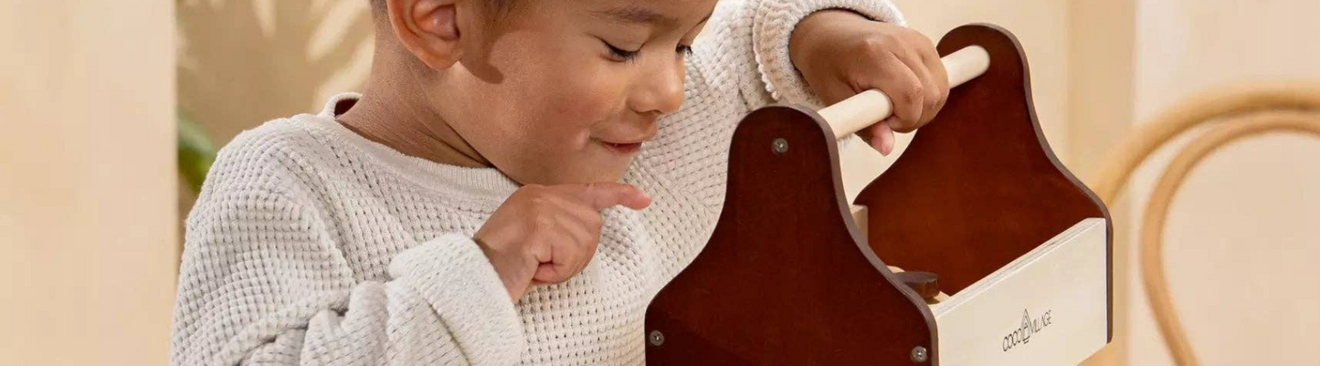 Boy Enjoying His Heirloom Wooden Toolset – Eco-Friendly, Sustainable Toy for Imaginative Play