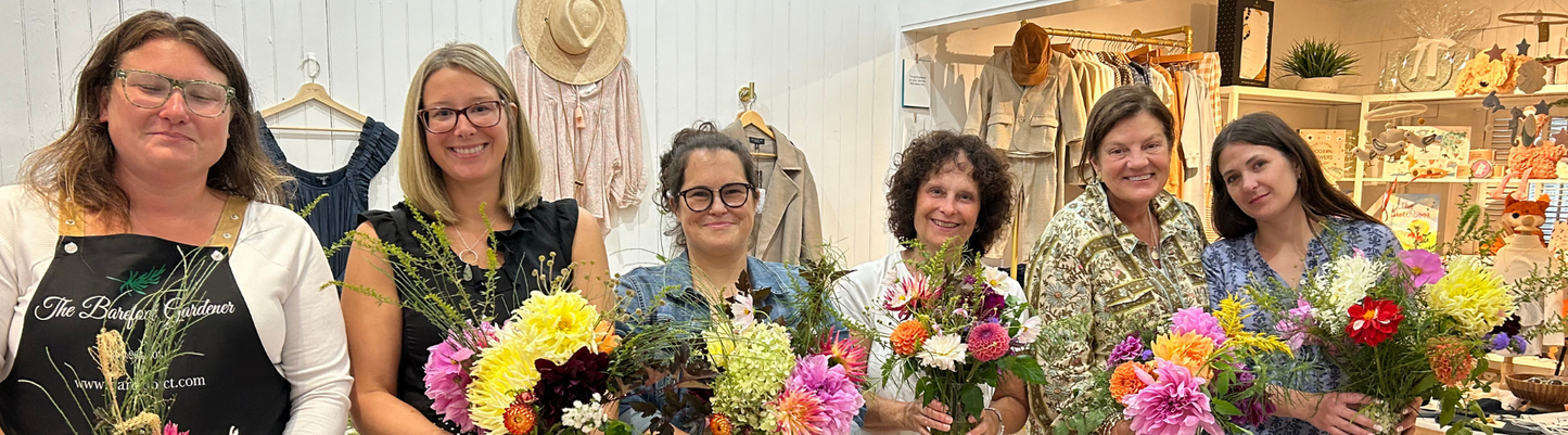 Women enjoying a local community event at Grace & Haven in Essex, CT, supporting small businesses and fostering connections during the winter season.