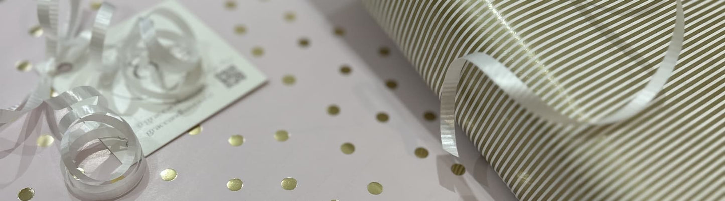 Wrapped baby shower gifts from Grace & Haven in Essex, CT, curated by a mom of 3 who gets it and refuses to carry anything but things that make life better - full stop.