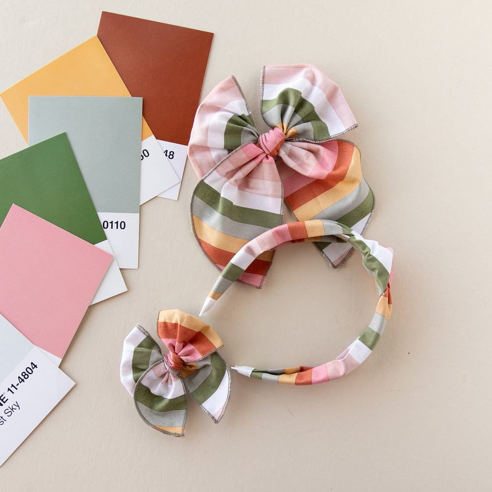 
                      
                        Paint The Rainbow | Petite Party Bow
                      
                    