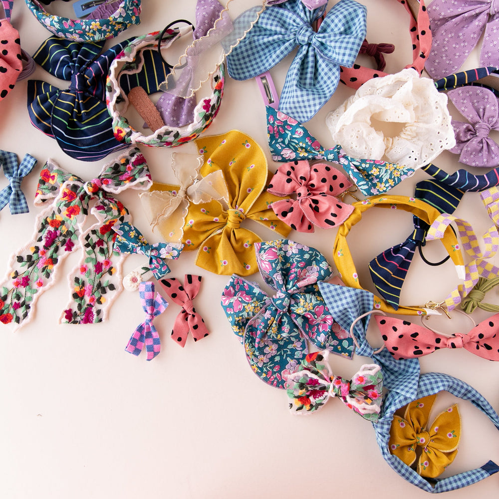 
                      
                        Dandelion | Party Bow
                      
                    