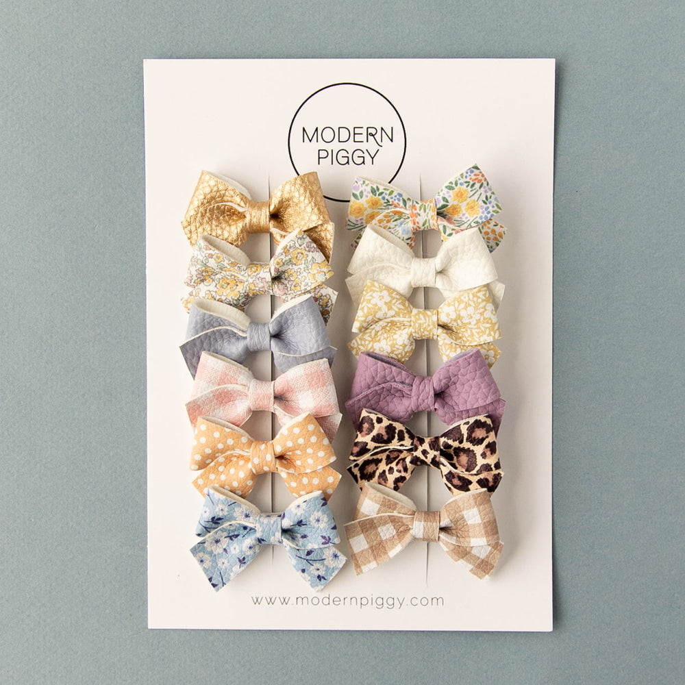 
                      
                        Grape | Leather Baby Bow
                      
                    