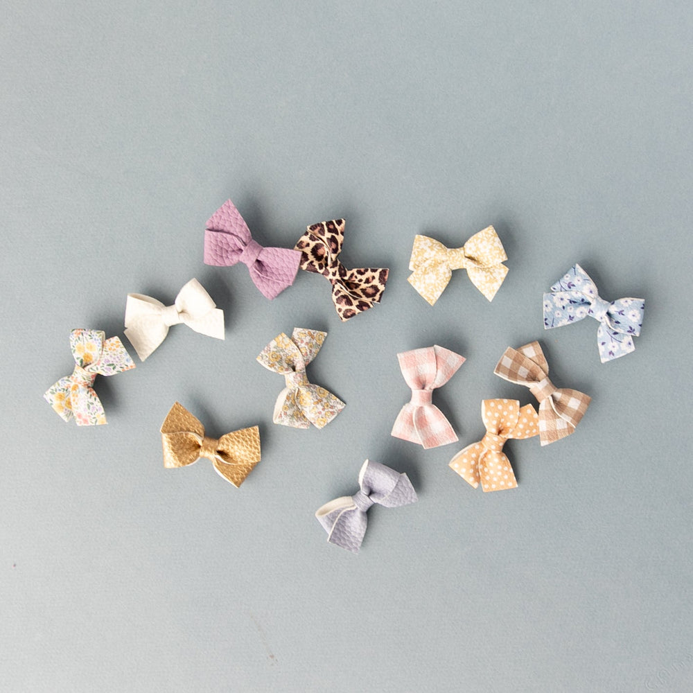 
                      
                        Grape | Leather Baby Bow
                      
                    