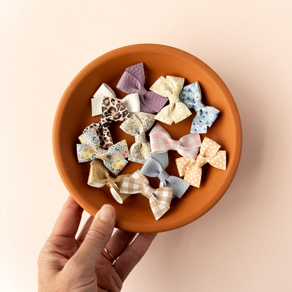 
                      
                        Blossom | Leather Baby Bow
                      
                    