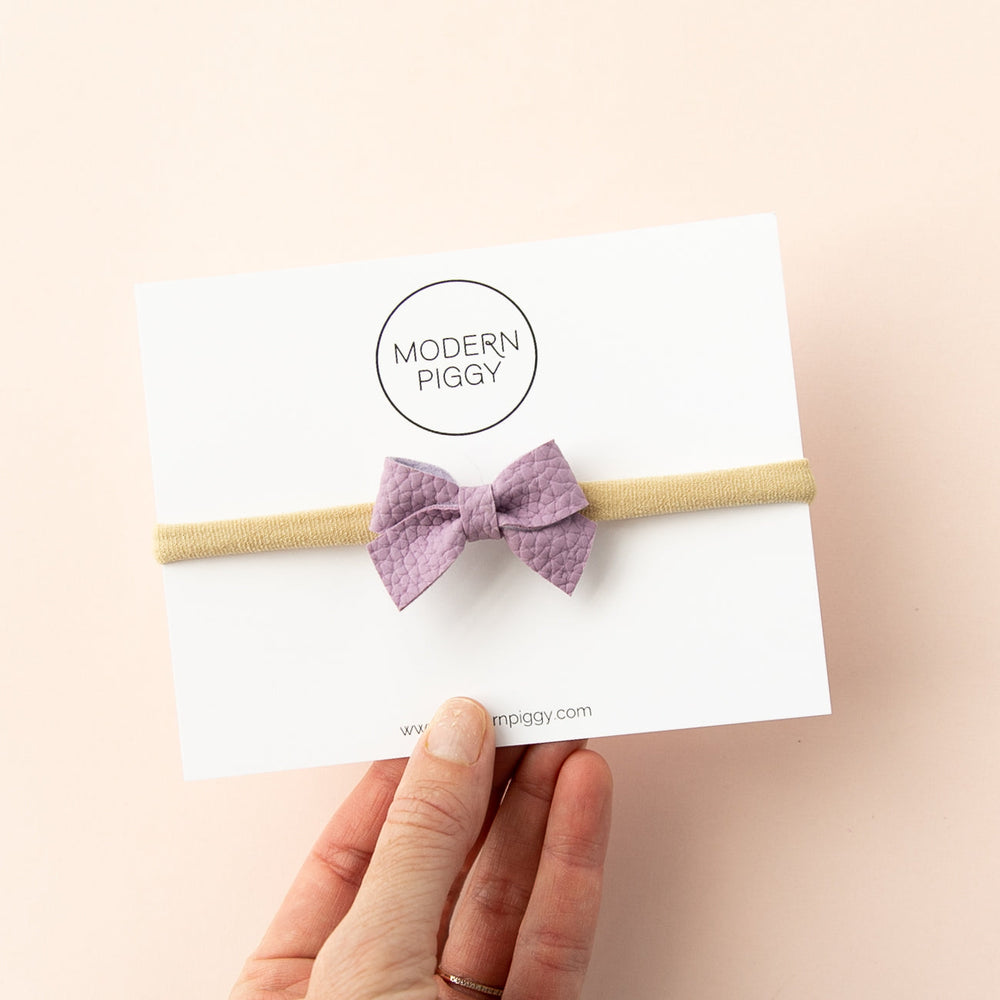 
                      
                        Grape | Leather Baby Bow
                      
                    