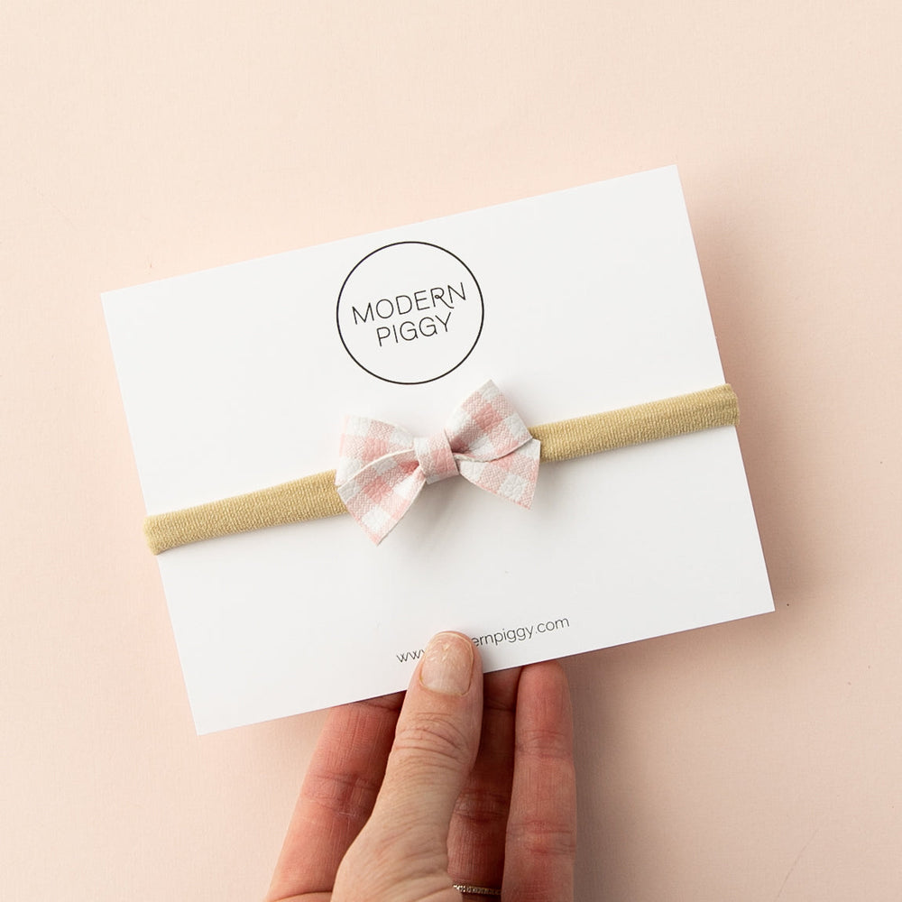 
                      
                        Petal Gingham | Leather Baby Bow
                      
                    