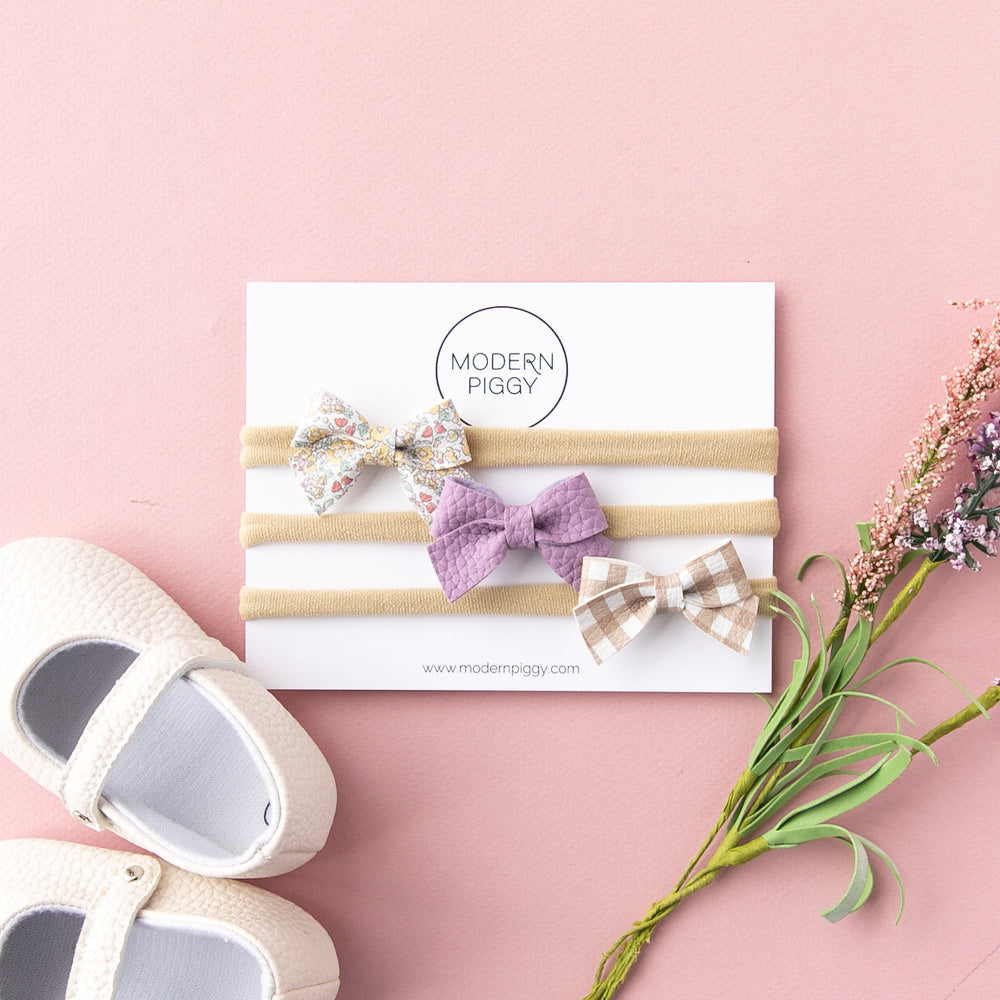 
                      
                        Blossom | Baby Bow Set
                      
                    