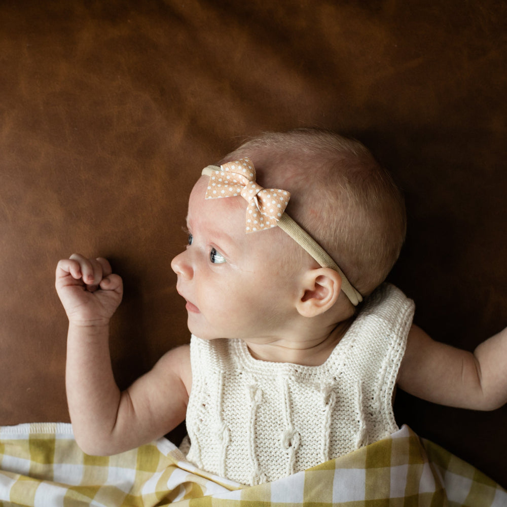 
                      
                        Peach Polka | Leather Baby Bow
                      
                    