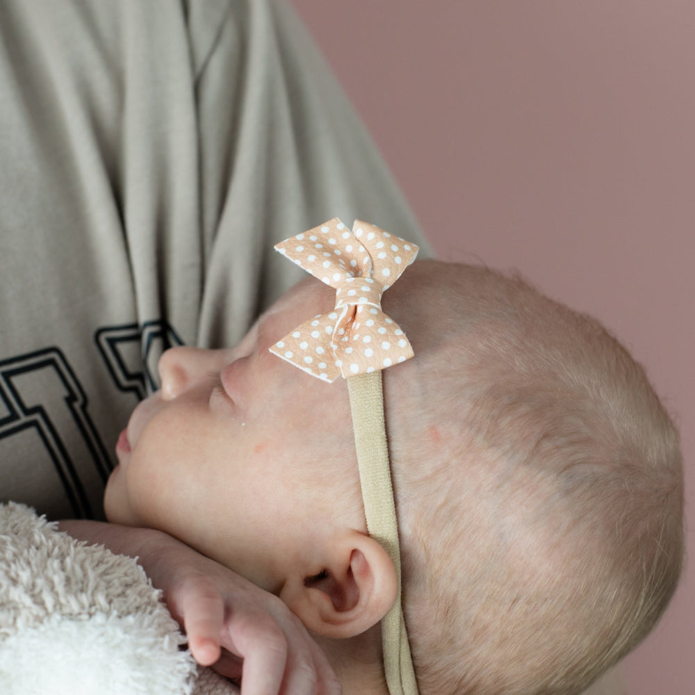 
                      
                        Peach Polka | Leather Baby Bow
                      
                    