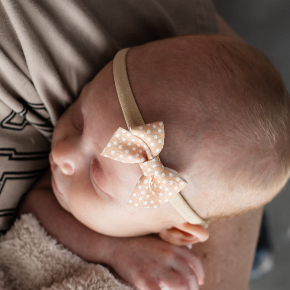 
                      
                        Peach Polka | Leather Baby Bow
                      
                    