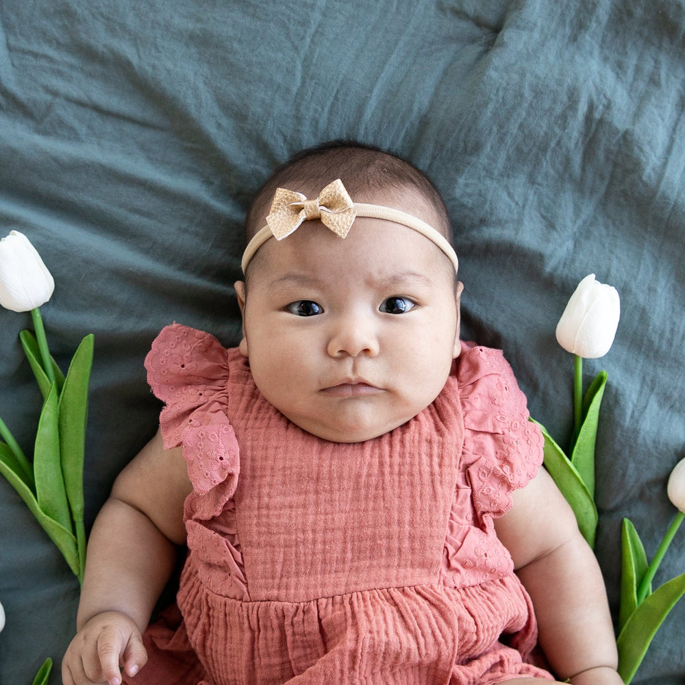 
                      
                        Gold | Leather Baby Bow
                      
                    