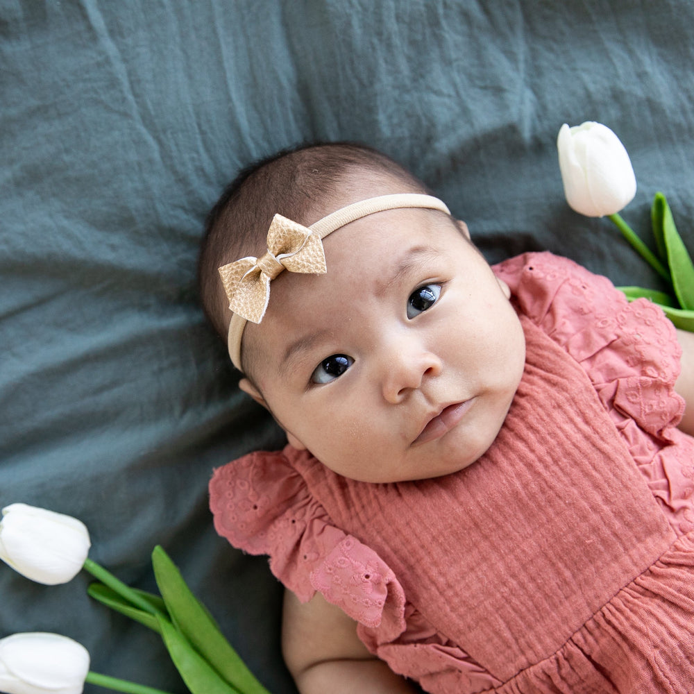 
                      
                        Gold | Leather Baby Bow
                      
                    