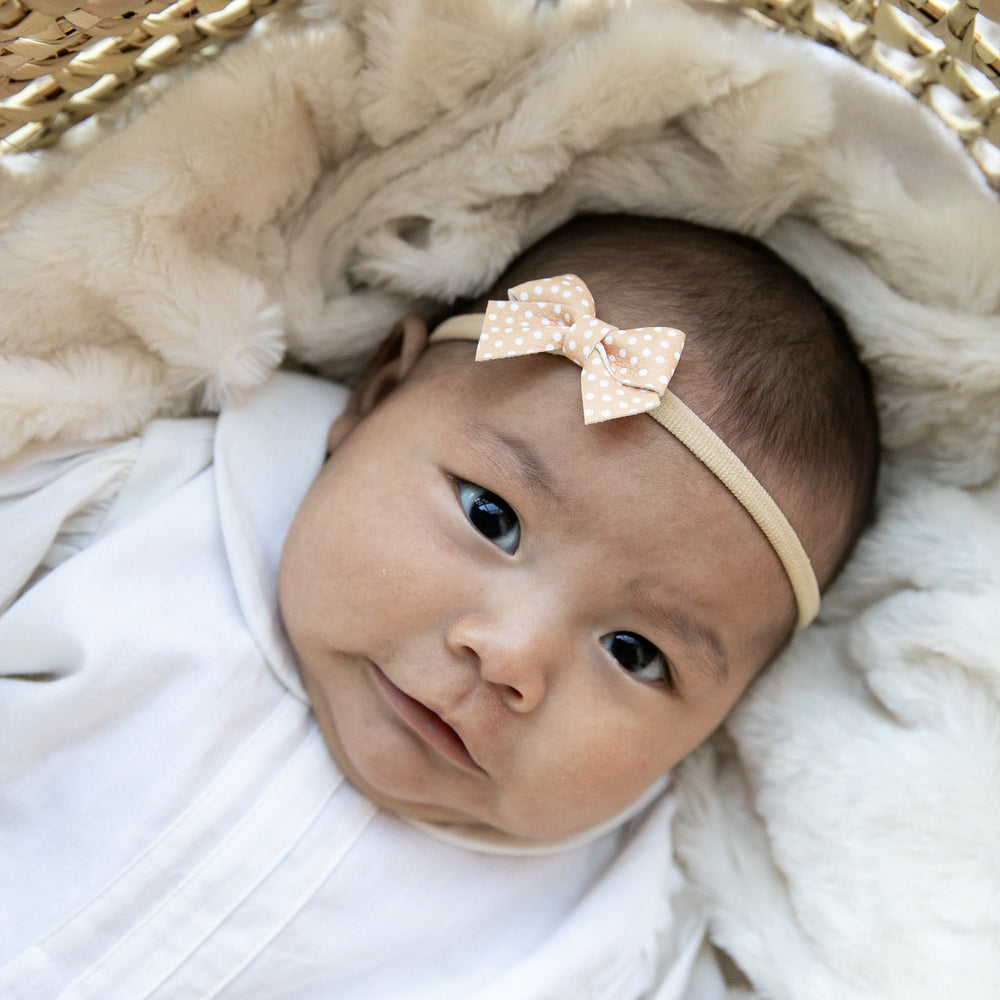 
                      
                        Peach Polka | Leather Baby Bow
                      
                    