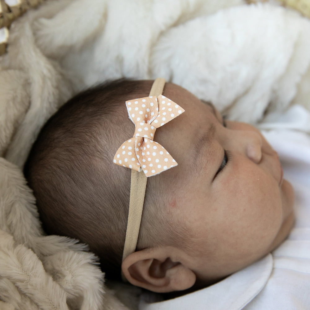 
                      
                        Peach Polka | Leather Baby Bow
                      
                    