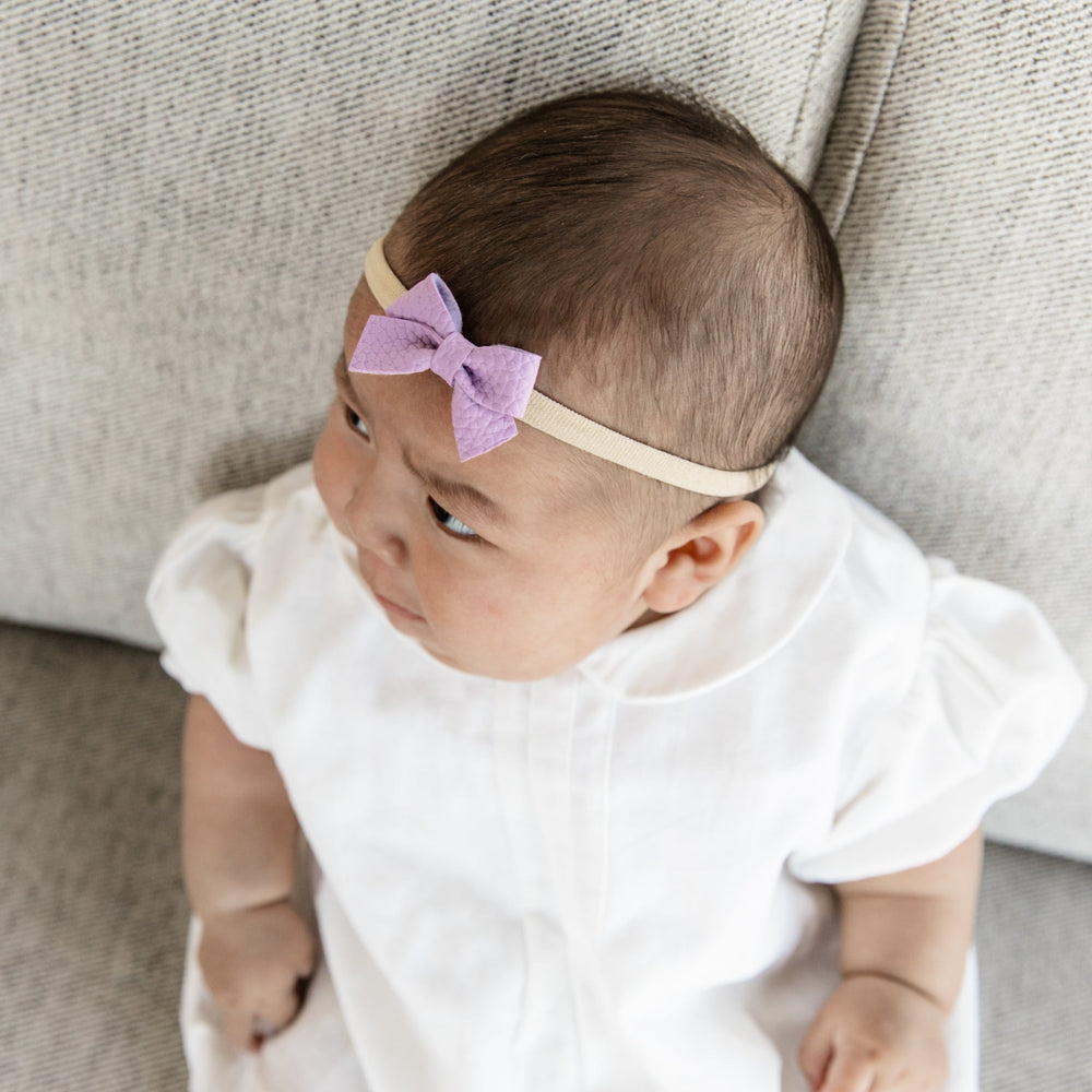 
                      
                        Grape | Leather Baby Bow
                      
                    