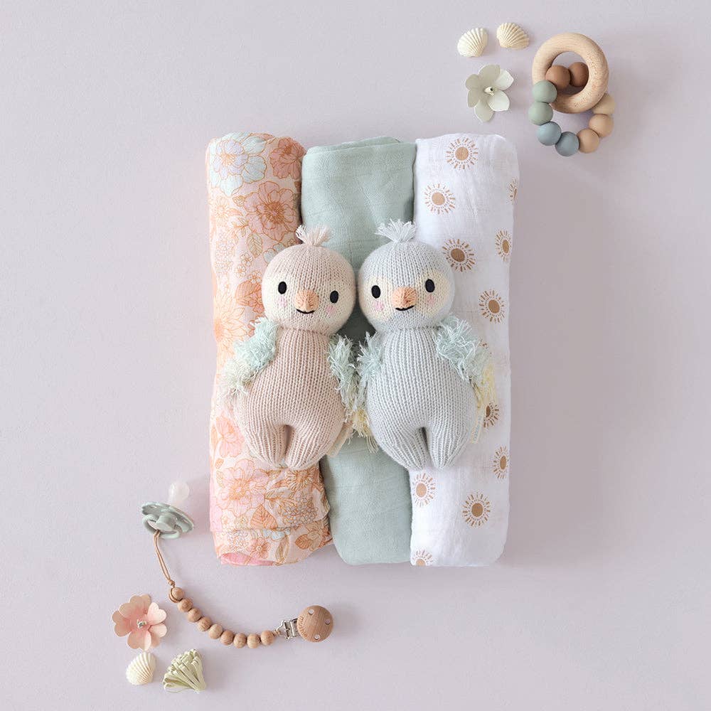 
                      
                        Baby Parrot (Sky Blue) – Hand-Knit Collectible Doll | Gives 5 Meals
                      
                    