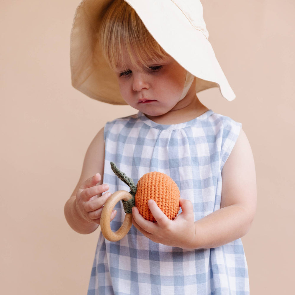 
                      
                        Cotton Crochet Rattle Fruit Orange Baby Teether – Clementine by The Blueberry Hill
                      
                    