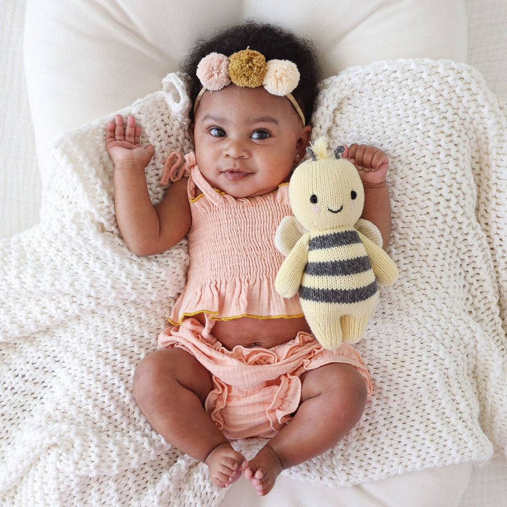 
                      
                        Cuddle + Kind Baby Bee – Hand-Knit Cotton Doll That Gives 5 Meals | Fair Trade Heirloom Toy
                      
                    