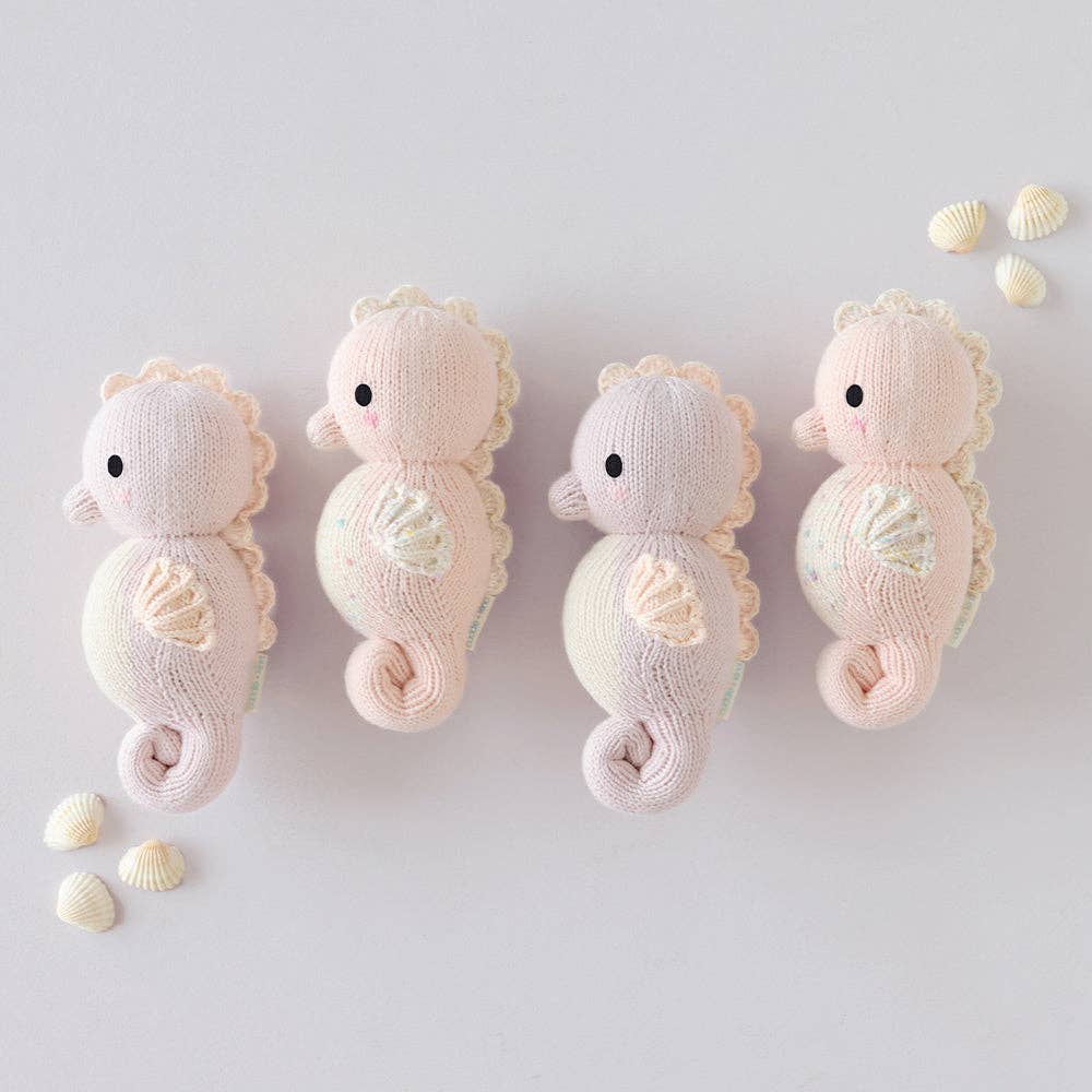 
                      
                        Baby Seahorse (Lilac) – Hand-Knit Collectible Doll | Gives 5 Meals
                      
                    