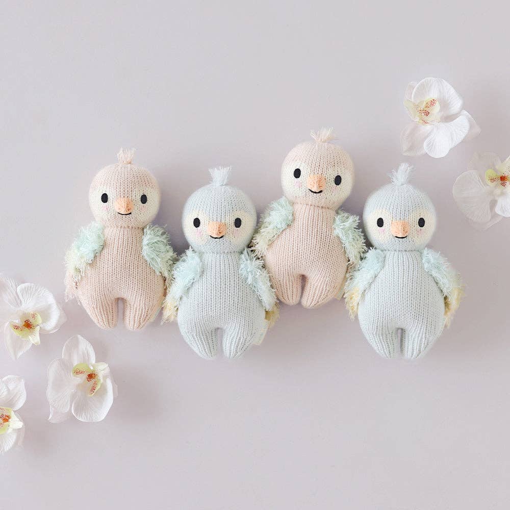 
                      
                        Baby Parrot (Sky Blue) – Hand-Knit Collectible Doll | Gives 5 Meals
                      
                    
