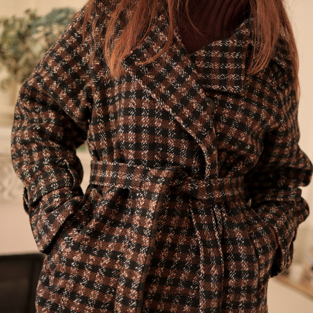 
                      
                        Plaid wool coat by Laura Laval Paris
                      
                    