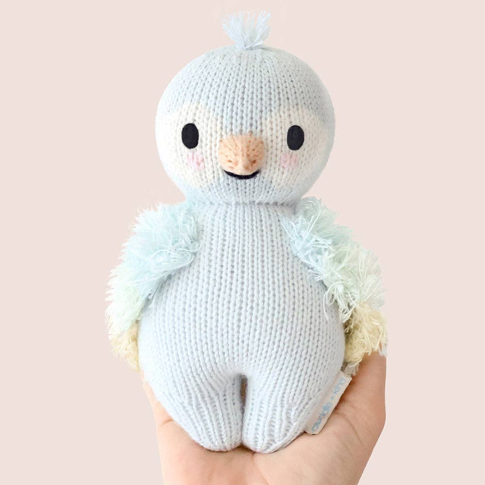 
                      
                        Baby Parrot (Sky Blue) – Hand-Knit Collectible Doll | Gives 5 Meals
                      
                    